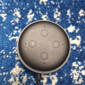 The Amazon Echo Dot (3rd Generation) is a voice-controlled smart speaker with AI